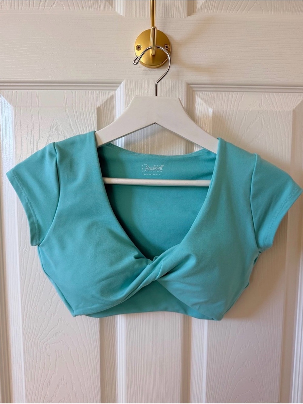 Bombshell Sportswear Teal Twist-Front Crop Top